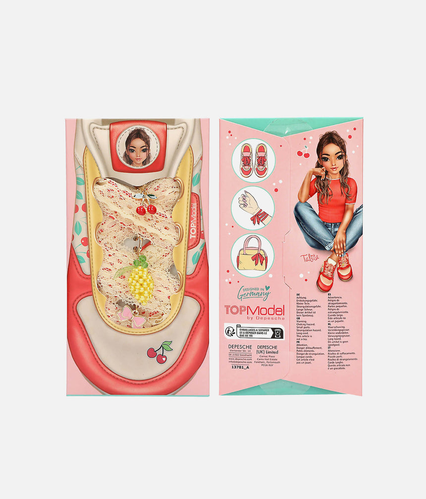 Front and back of TOPModel DIY Laces and Charms fruit set with pineapple, cherry and bow charms on its card
