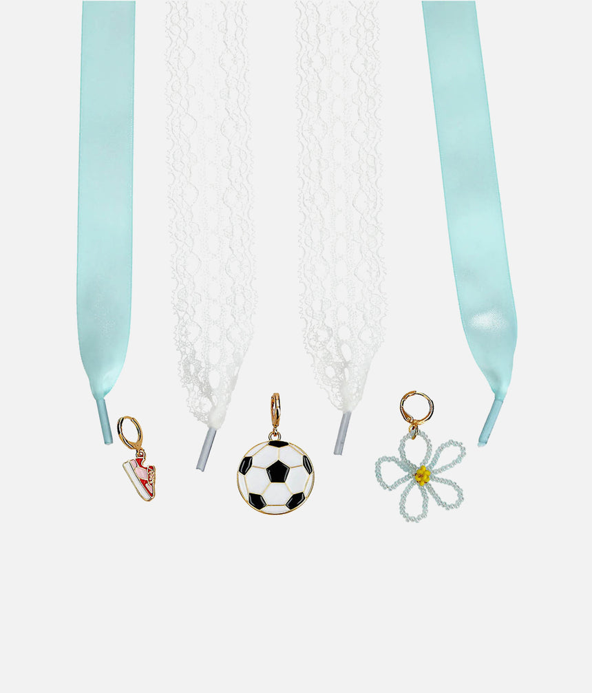 TOPModel aqua satin and white lace shoelaces with football, red trainer and beaded flower clip-on charms