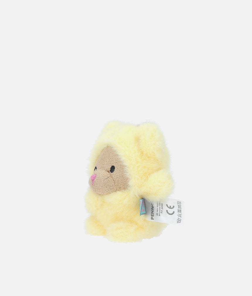 A small yellow plush toy with a knitted beige face, black embroidered eyes, and a pink nose, shown against a plain light gray background. A small product tag is attached to the side.