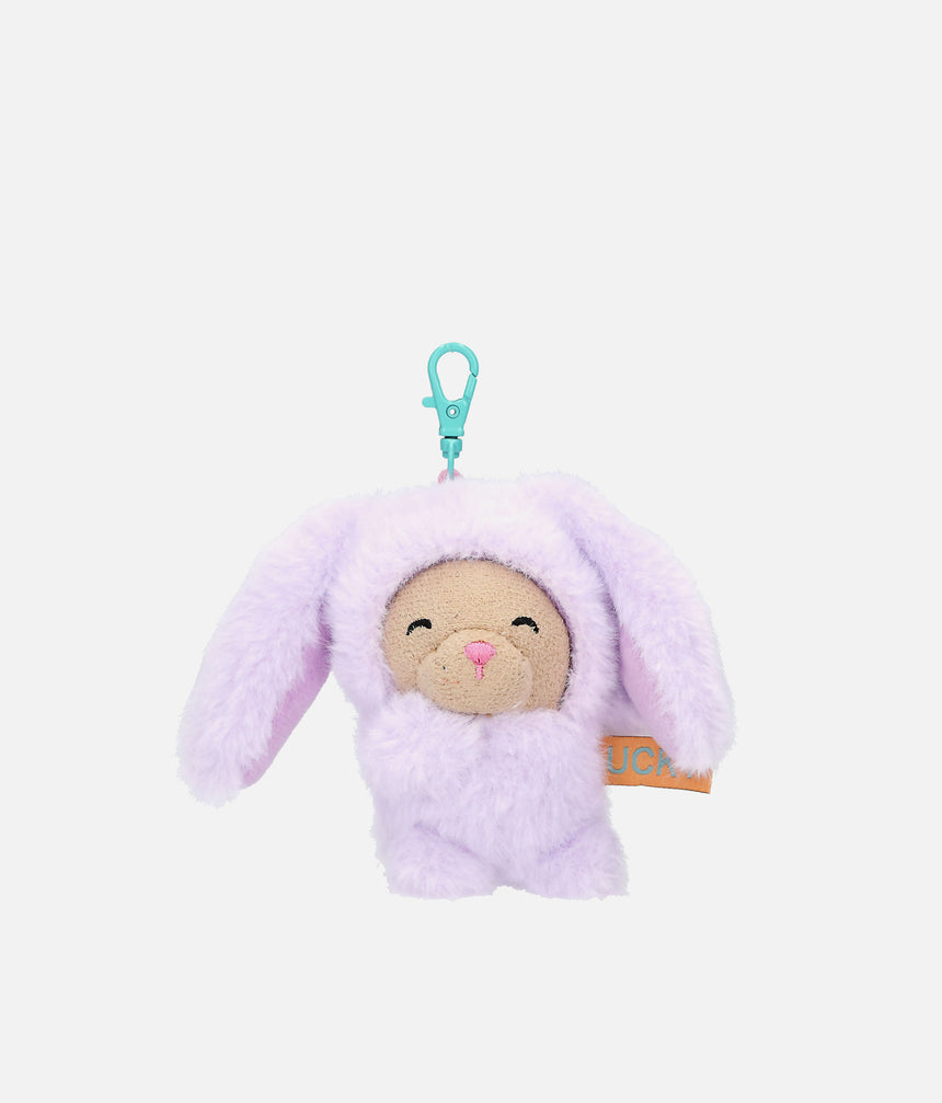 PENfection Tiny Crew Lucky dog bag charm wearing a purple rabbit jumpsuit with long floppy ears
