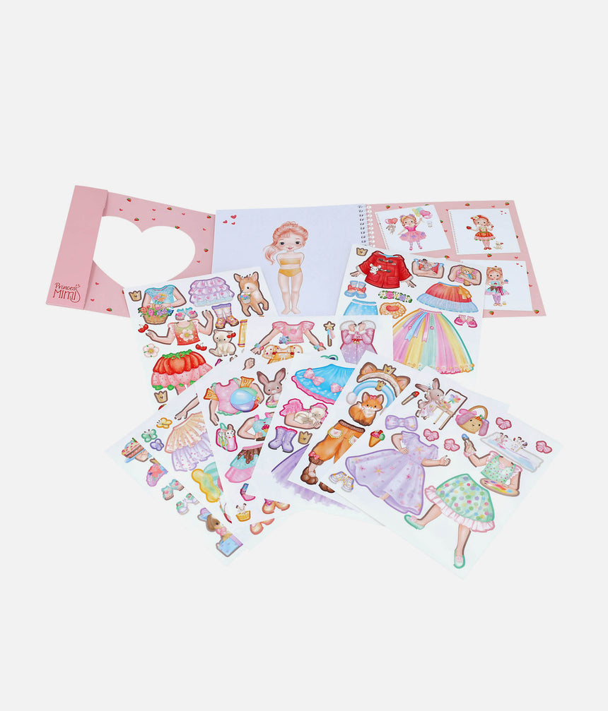 Princess Mimi Dress Me Up book with sticker sheets fanned out, showing dresses, shoes, accessories and animal friends