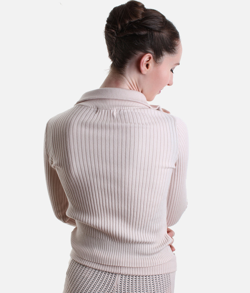 Back view of the Pink Capezio Lynch quarter zip jumper, showing its covered ribbed back, folded collar and ribbed waistband above matching shorts.