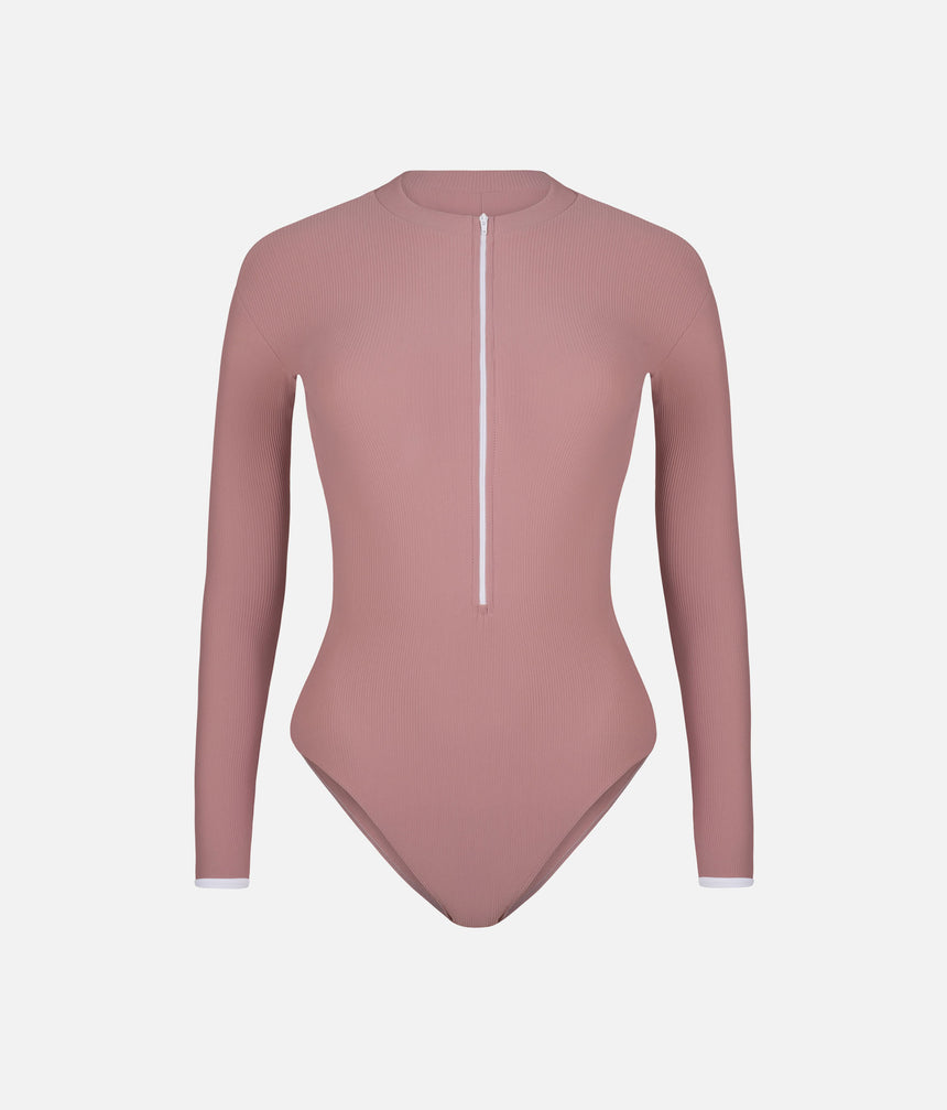 Mara Dancewear Aura Long Sleeve Dusty Rose ballet leotard, front view with ribbed fabric, white zip and cuff trim.