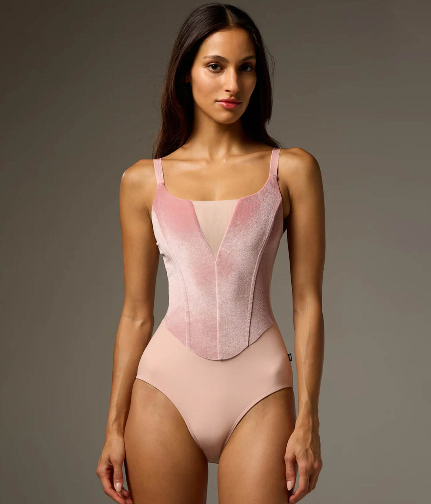 Front of Bodile Bella Bon Bon pink leotard with rose velvet corset-style panels, a pale mesh V insert and fine camisole straps.