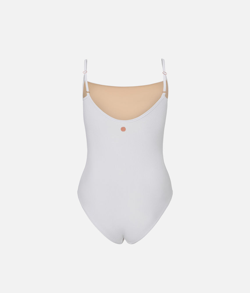 Back of Mara Dancewear Cala White leotard, showing adjustable straps and front lining visible through the scoop back.