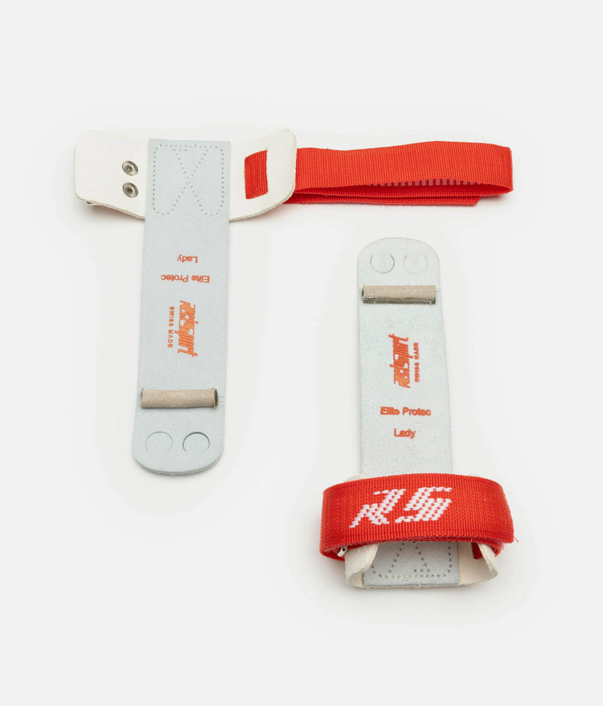 Reisport Elite Protec uneven bar grips showing an open wrist strap, leather palms and attached dowels