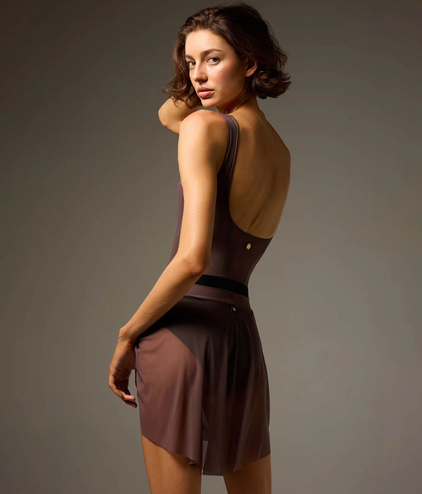 Dancer wearing a Twilight Bodile Mika mesh ballet skirt with gathered ruching and a left-side split over a leotard.