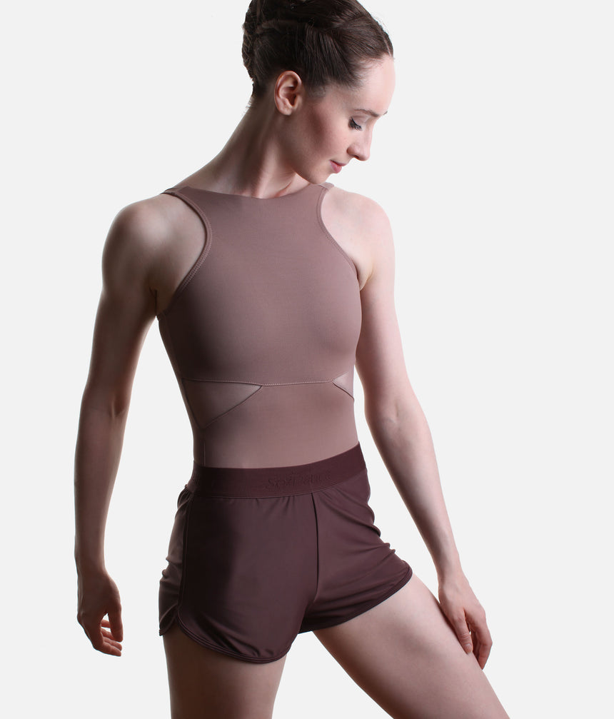 So Danca SD2561 Ebano Brown dance shorts with a relaxed cut and rounded hems, styled with a Nut leotard