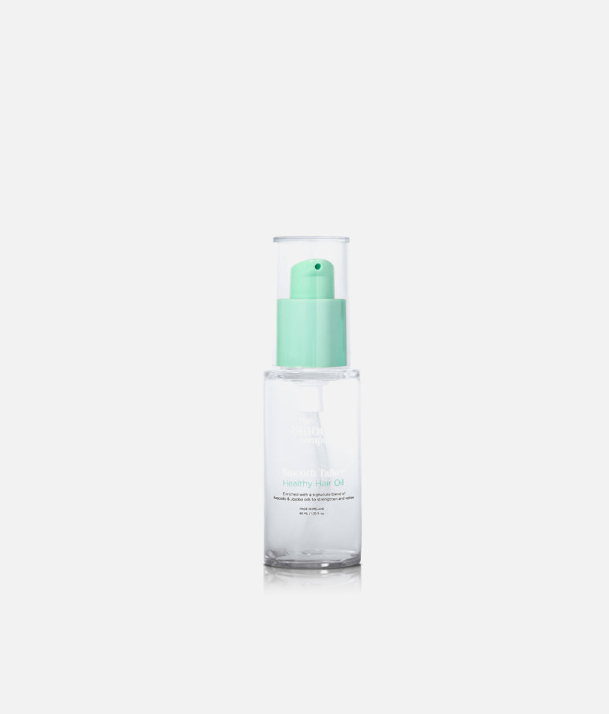 The Smooth Company Smooth Talker Hair Oil 40ml in a clear bottle with a mint-green pump and transparent cap.
