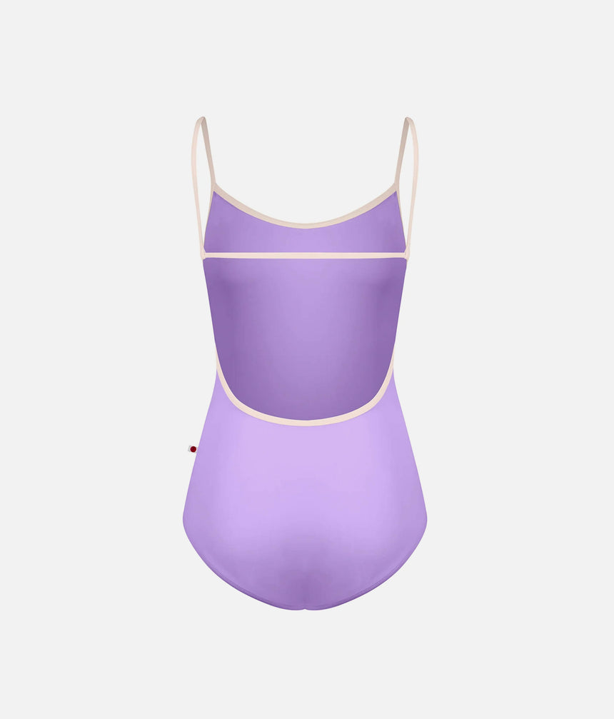 YUMIKO Tamara Iris leotard, back product view showing the low curved opening framed by Misty Rose trim and a horizontal strap.
