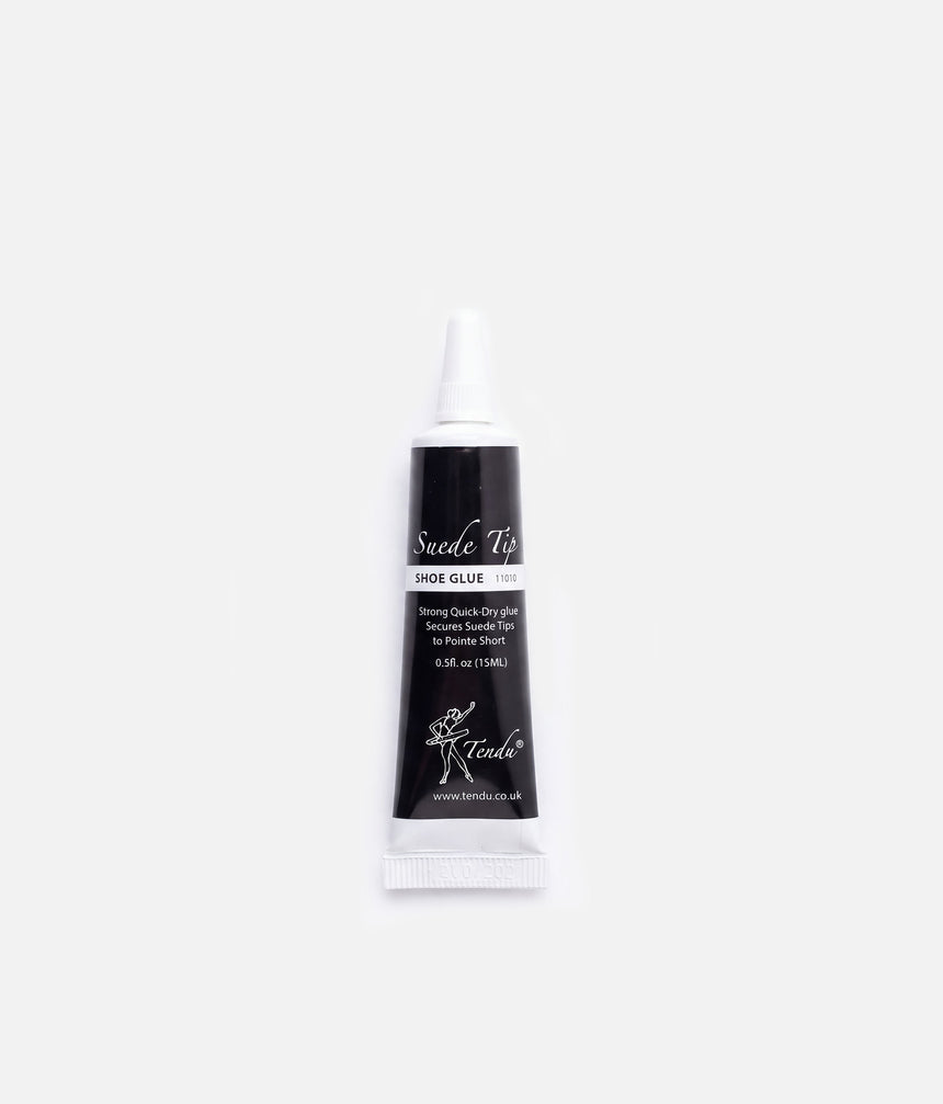 Front of a Tendu Suede Tip Shoe Glue tube with a black label, white screw cap and ballerina logo on a white background.