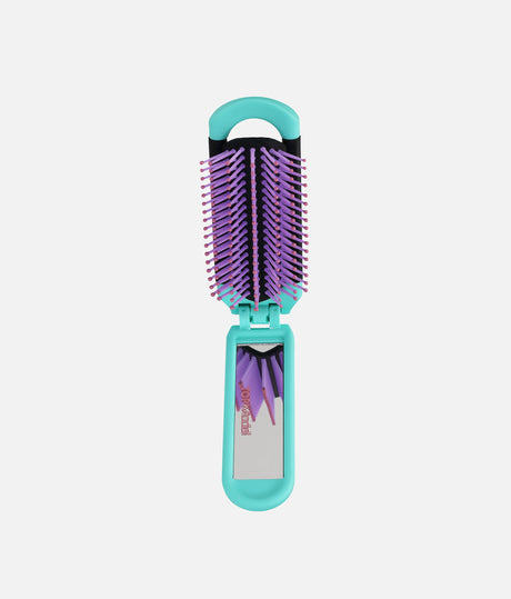 Open turquoise TOPModel folding hairbrush showing purple bristles with pink tips and a mirror inside the handle