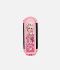 A pink folding hair clip with a cartoon doll illustration on the front and the text 'HAVE A GOOD HAIR DAY' printed below, shown against a plain light gray background.