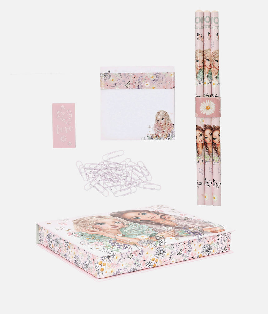 Collection of stationery items including a box, paper, and clips on a white background