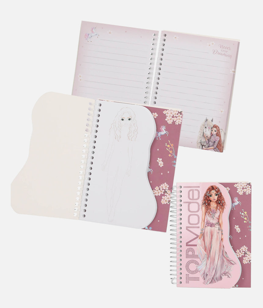 Notebook with fairy design on a white background