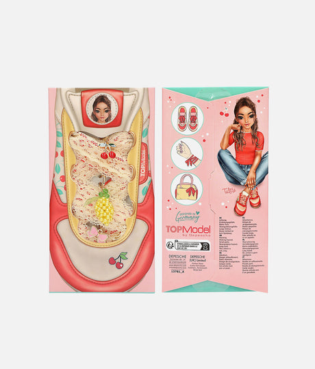 Front and back of TOPModel DIY Laces and Charms fruit set with pineapple, cherry and bow charms on its card