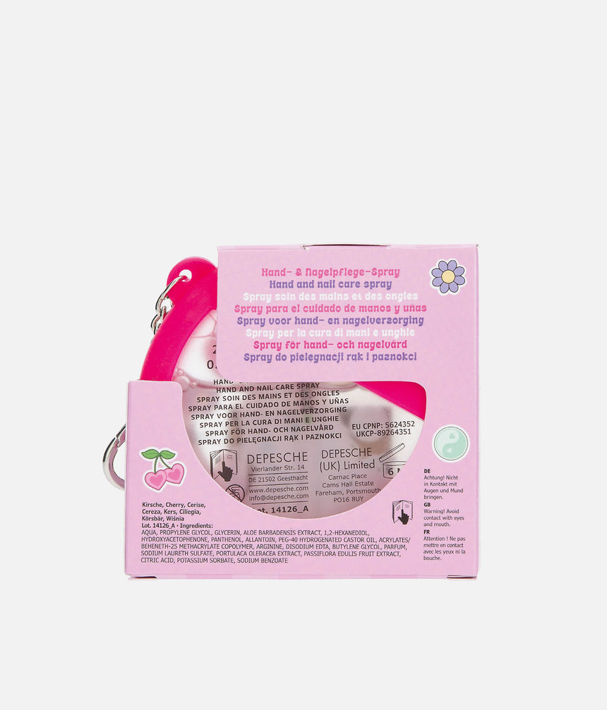 Back of TOPModel GLOW TO GO hand and nail care spray packaging showing the cherry scent, ingredients and warning