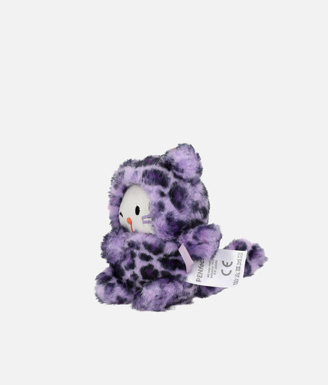 A small plush toy shaped like a cat wearing a purple and black spotted animal-print hooded outfit, with a white face and a hangtag attached, photographed on a plain light gray background.