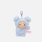PENfection Tiny Crew Happy dog bag charm wearing a blue dog jumpsuit with a purple clip