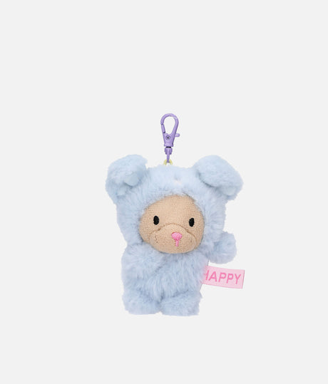 PENfection Tiny Crew Happy dog bag charm wearing a blue dog jumpsuit with a purple clip
