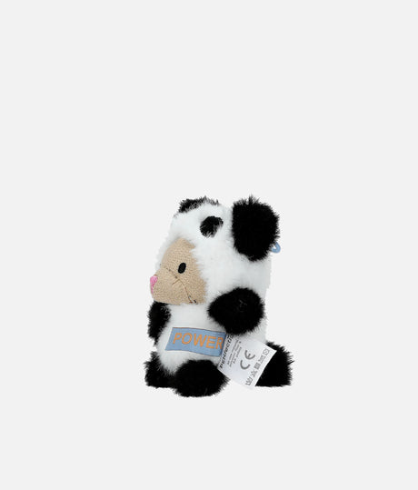 A small plush panda toy with black and white fur, a beige snout, and a pink nose, sitting against a plain light gray background. A blue tag reading 'POWER' is attached to its neck, and a white tag is wrapped around its belly.