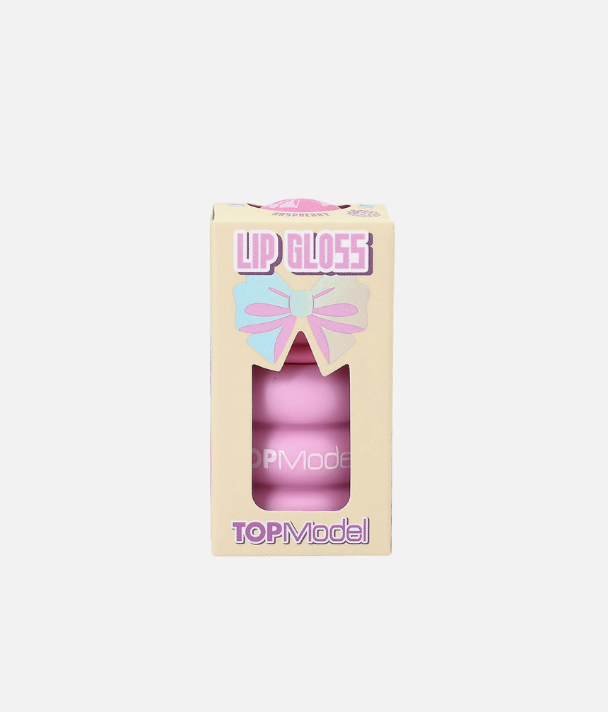 TOPModel raspberry Bubble KPOP lip gloss in a light pink bottle inside a pale yellow window box with a bow design