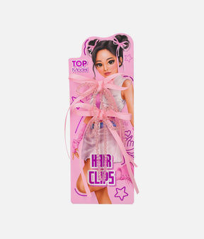 Two pink TOPModel KPOP ribbon bow hair clips with clear faceted bead strands and long tails on a Yena presentation card