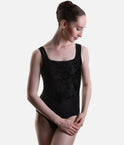 Black Capezio Cristóbal tank leotard showing a soft square neckline, tonal floral bodice and pointed waist seam.