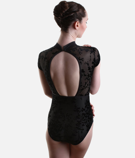 Back view of Black Capezio Rudi leotard showing the large rounded opening, neckband fastening and sheer floral panels around the shoulders.
