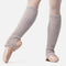 Side view of Intermezzo Prebagui 2015 Pink stirrup legwarmers, with soft ribbed knit extending over the insteps of ballet shoes.