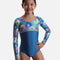 Mondor SEA 27836 girls’ long sleeve gymnastics leotard with colourful printed sleeves and upper panel, a plain blue body and lime contrast trim.