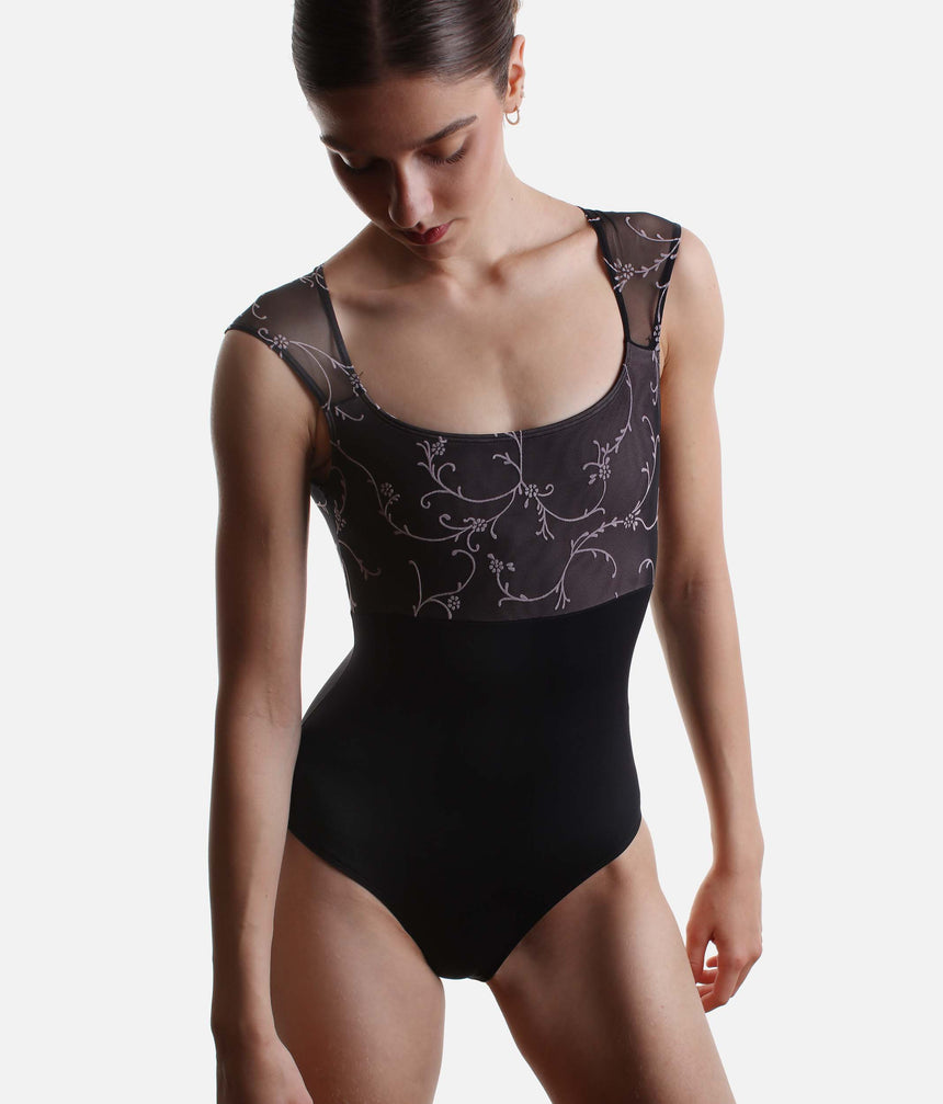 Intermezzo Ilaria 31742 ballet leotard in black, with a round neckline, soft pink floral tulle and cap sleeves.