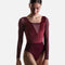 Intermezzo Iseult 31747 long sleeve ballet leotard in burgundy, with a velvet bodice and matching tulle neckline detail.