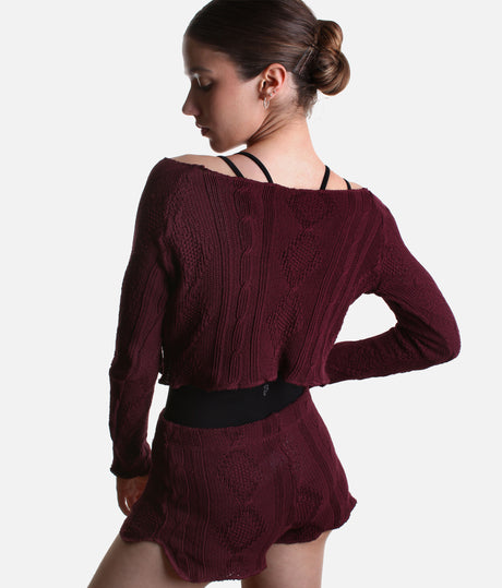 Back view of the Intermezzo Ismene 6677 cropped knit sweater with long raglan sleeves and matching Ippolita shorts.
