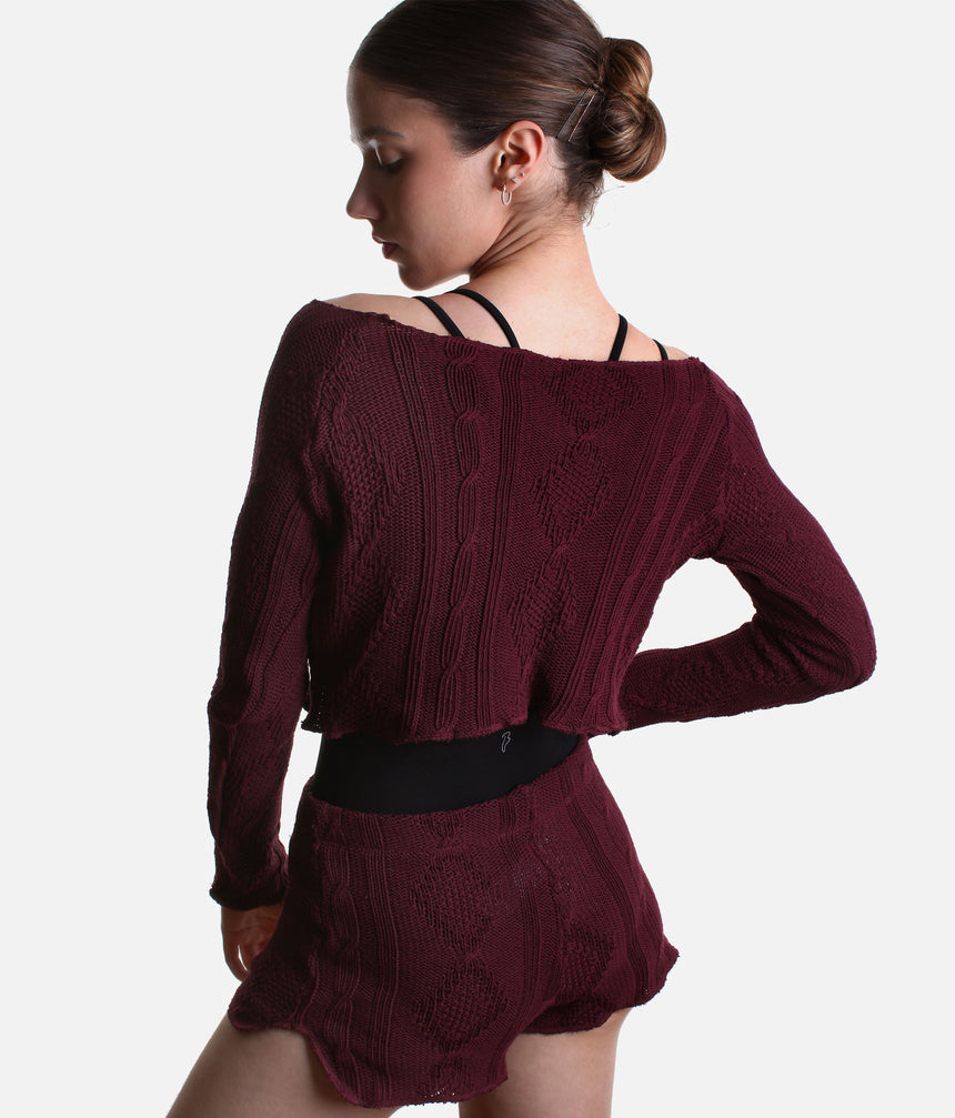 Back view of the Intermezzo Ismene 6677 cropped knit sweater with long raglan sleeves and matching Ippolita shorts.