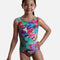 Mondor VIVID 7822 girls’ sleeveless gymnastics leotard with multicoloured abstract patches, fine heart outlines and a round neckline.