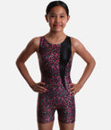 Mondor Cheetah 7826 girls’ gymnastics biketard with shimmering pink, black and green animal print, a tapered black panel and built-in shorts.