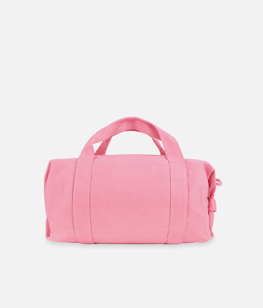 Back view of the Repetto B0390T pink duffle bag showing the external patch pocket between the stitched carry handles.