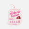 Make Up Eraser Cheeky Neutrals 7-Day Set in a pink cloud-shaped hanging pouch with a heart-shaped window showing the pink makeup pads inside, on a light gray background.