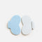 Tendu Inlay Size Changer inserts laid side by side, showing their shaped outline, side tabs and blue and white surfaces.