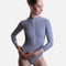 Front view of Mara Dancewear Aura Long Sleeve leotard in Soft Misty Blue with ribbed fabric, high neck and front zip.