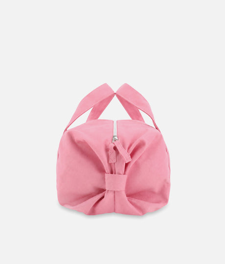 End view of the Repetto B0390T pink ballet bag showing its rounded shape, gathered bow detail and zip pull.