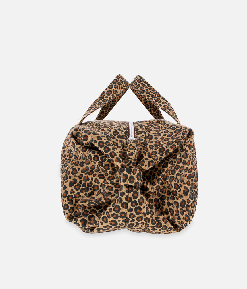 End view of the Repetto B0390TL leopard-print ballet bag showing the rounded shape, gathered side knot and zip pull.