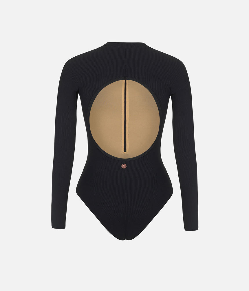 Back worn view of Mara Dancewear Aura Long Sleeve in Total Black showing the large rounded open back.