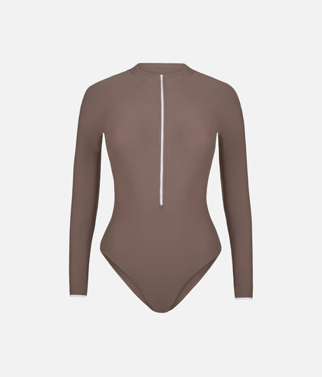 Front of Mara Dancewear Aura Long Sleeve Deep Brown leotard, with ribbed fabric, high neck and contrasting white zip.
