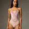 Front of Bodile Bella Bon Bon pink leotard with rose velvet corset-style panels, a pale mesh V insert and fine camisole straps.