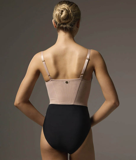 Back of Bodile Bella Noire Nougat leotard, showing the nougat mesh panel, adjustable straps, gold hardware and black lower body.