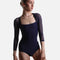 Bodile Saskia Prussian Blue ballet leotard with a square neckline, navy body and sheer three-quarter mesh sleeves.