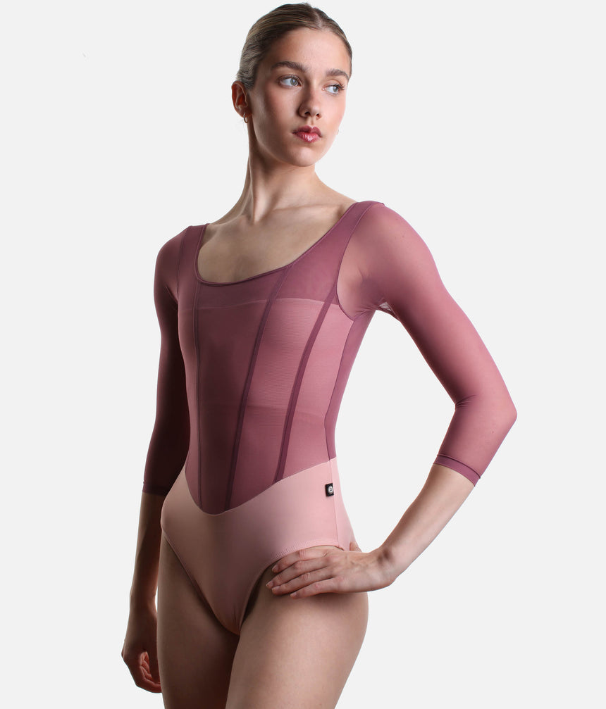 Angled front view of Bodile Sofia Mexican Rose ballet leotard, showing the fitted panelled bodice and sheer rose mesh sleeves.