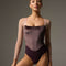 Front of Bodile Valentina Nougat Mink leotard with mink-toned velvet corset panels, sheer beige sleeves and a square neckline.